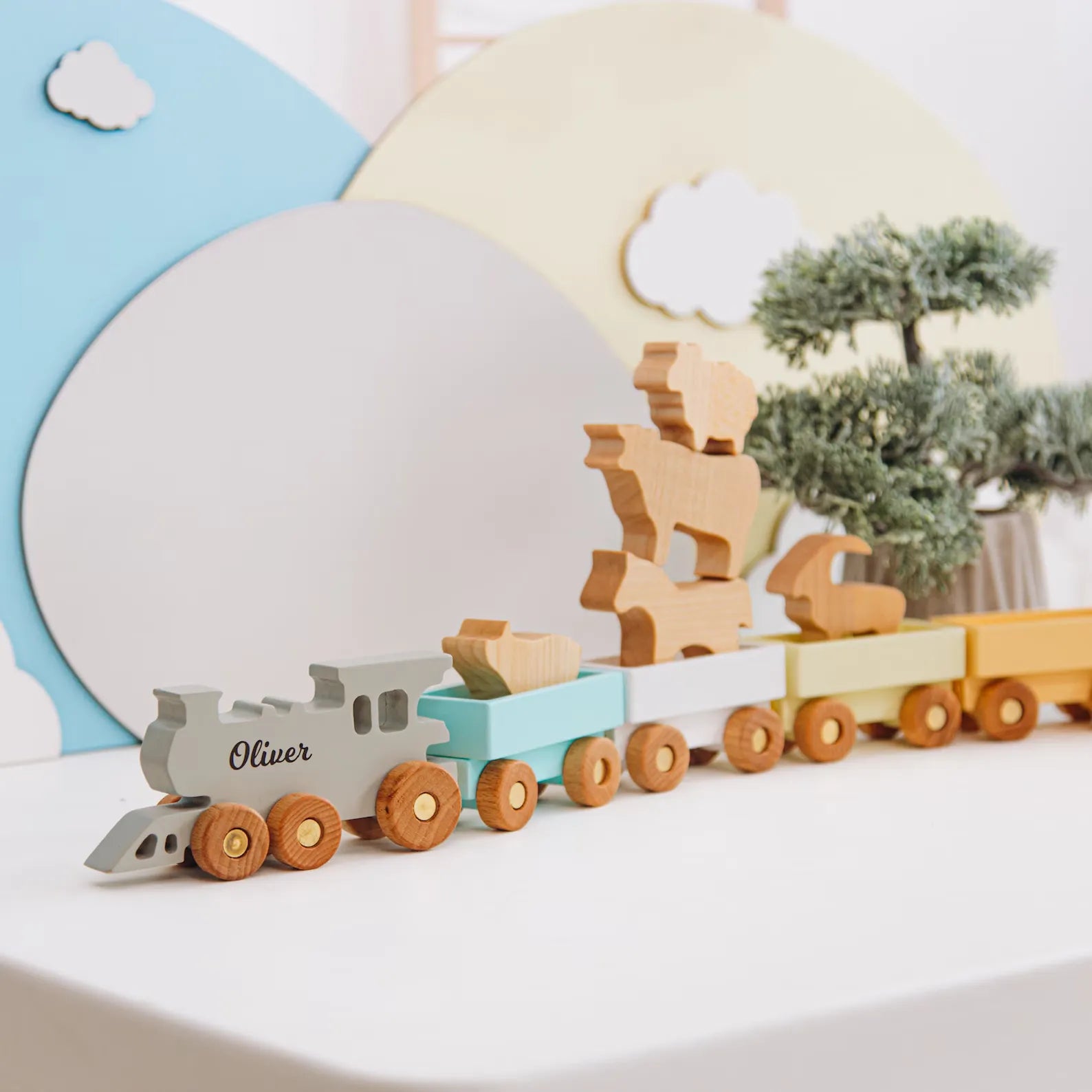 Colorful wooden train set – includes animal figures for pretend play