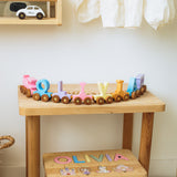 Custom name train in pink and purple – wooden toy for little girls