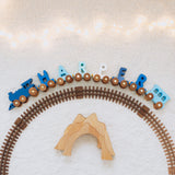 Personalized wooden train for boy – custom name toy in blue tones