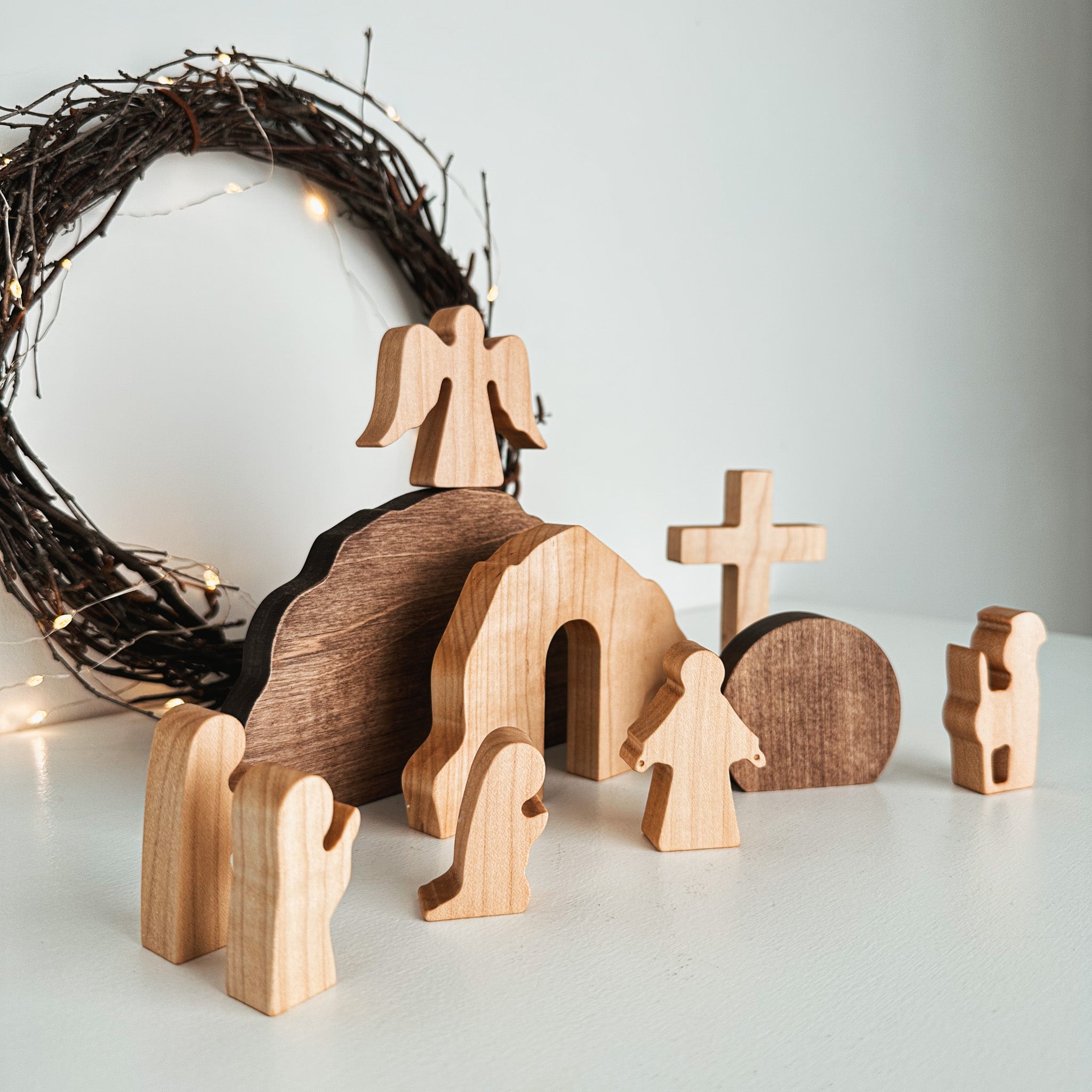Handcrafted wooden Resurrection Scene depicting the empty tomb and angel, perfect for Easter decor