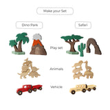 Collection of wooden toy figures and vehicles on a white background