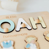 Wooden name puzzle with colorful letters and decorative elements on a light background
