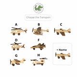 Set of wooden toy vehicles including helicopters and airplanes on a white background with a crocodile logo.