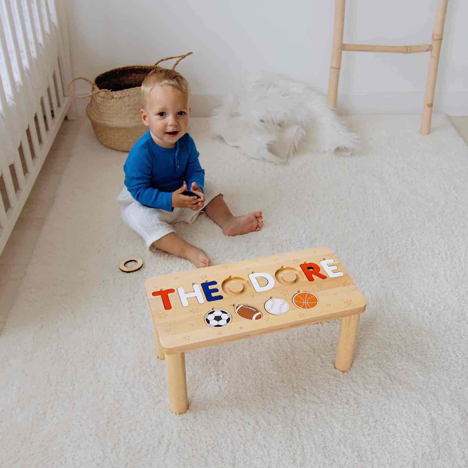 Personalized toddler step stool with name puzzle and Rookie of the Year theme on wooden base