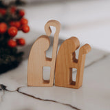 Close-up of wooden shepherds figurines in light wood
