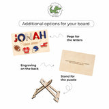 Wooden name puzzle board with additional components on a white background